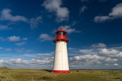 The List West lighthouse on the coast of the Ellenbogen peninsula, List, island of Sylt, district