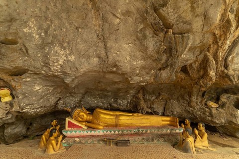 Reclining Buddha in the Tham Xang elephant cave near Vang Vieng, Laos, Asia