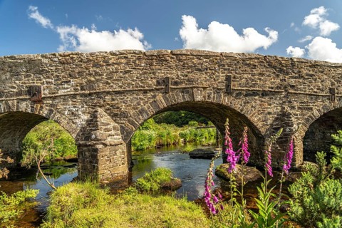 Stone bridge over the East dart river in Postbridge, Dartmoor, Devon, England, Great Britain
