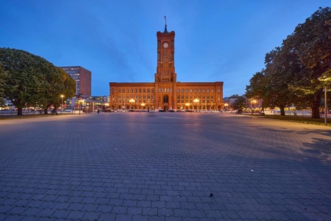 Red Town Hall with trees and square at dusk, Rathausstraße, Berlin, capital city, independent city,