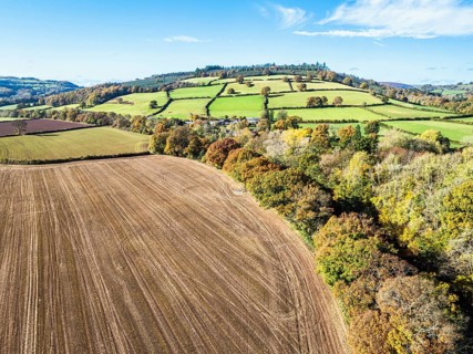 Fields and Farms over River Usk from a drone, Brecon, Brecon Beacons, Powys, Wales, England, United