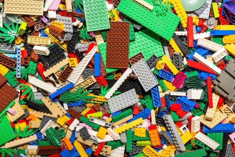 Different coloured Lego bricks and Lego plates, chaotically distributed, Copenhagen, Denmark,