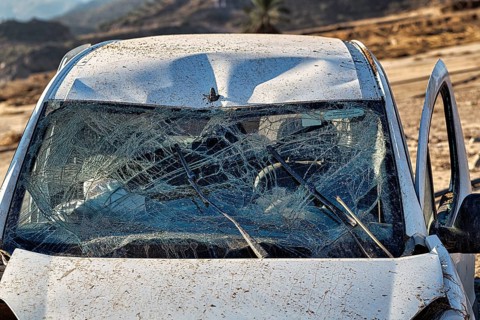 Car, shattered windscreen, total loss after flood, flood damage after flood disaster in Almeria,