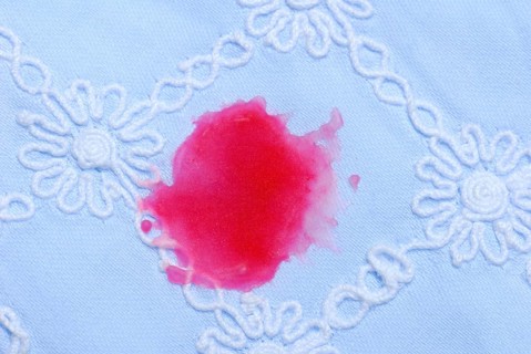 Stains of candle wax on fabric, tablecloth