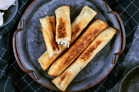 Fresh baked Börek, a baked filled pastries made of a thin flaky dough filled with sheep milk cheese