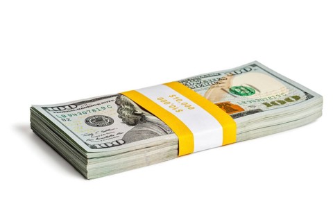 Creative business finance making money concept bundle of 100 US dollars 2013 edition banknotes