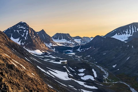 View into the valley Unna Räitavagge, also Unna Reaiddavaggi, during midnight sun, mountain
