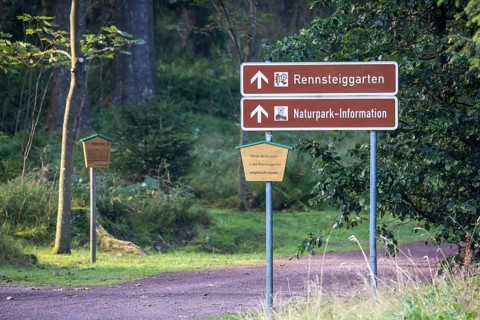 Rennsteig, popular hiking trail in the Thuringian Forest with signposts. Oberhof, Thuringia,