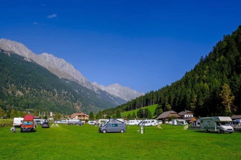 Campsite Antholz, Antholz Valley, behind mountains Rieserferner Ahrn nature park Park, South Tyrol,