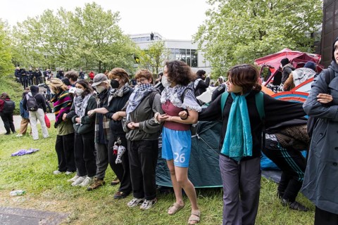 Human chain during the occupation of the courtyard of the Free University of Berlin by