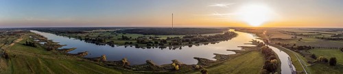 Panorama aerial view of river Elbe near Lenzen, marina Lenzen, view towards Höhbeck radio mast,