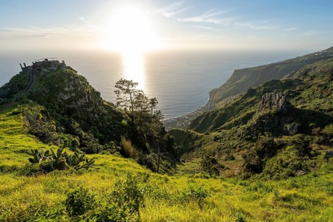 Evening mood, green coastal landscape on a steep cliff, sea and coast, viewpoint Miradouro da