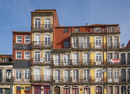 Colorful facades of houses along Cais da Estiva in the Ribeira district, Porto, Portugal, Europe