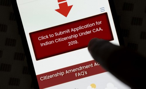 In this photo illustration, a portal to apply for Indian citizenship under the Citizenship