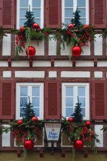House facade with Christmas decoration, window, window shutters, half-timbered, Christmas motif,