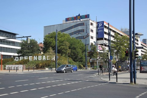 Market place with inscription and parking garage, advertising, Toys R Us, logo, Main, Offenbach,