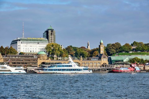 St. Pauli Landing Bridges on the River Elbe, with the Bismarck Monument in the background, Hamburg,