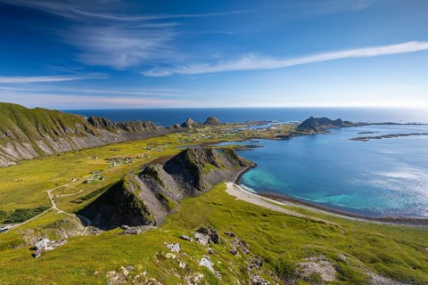 Coast and view of the village of Sørland on the island of Værøy, Vaeroy, Lofoten, Norway, Europe