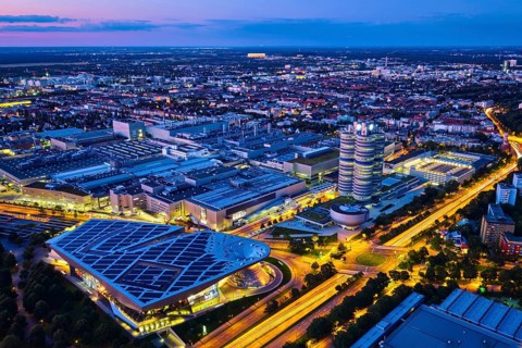 MUNICH, GERMANY, JULY 08, 2018: Aerial view of BMW Museum and BWM Welt and factory and Munich from
