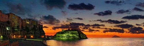 Panorama on the beach Lido Le Roccette Club Tropea with the old town of Tropea perched on rocks of