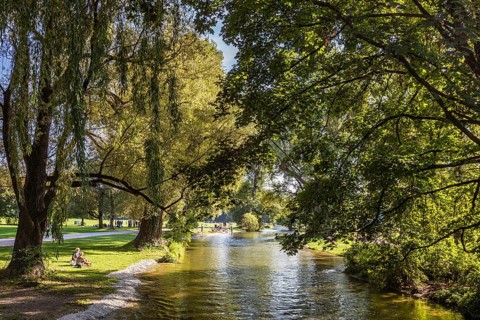 People at the Eisbach in the English Garden, Munich, Bavaria, Germany, Europe