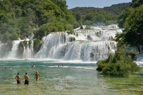 Tourists taking a bath at the Skradinski buk waterfalls, Krka National Park, Šibenik-Knin County,