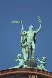 Sculptures Figures Chronos with sickle and putti, Greek, mythology, on the roof at Senckenberg