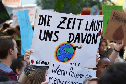 Heidelberg, Germany, September 2019: Protest sign cardboard saying Time is running out in German
