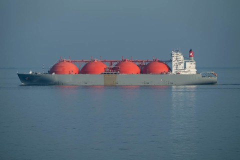 Liquefied natural gas is transported by LNG tanker Arctic Voyager, 290 metres long, 48 metres high,