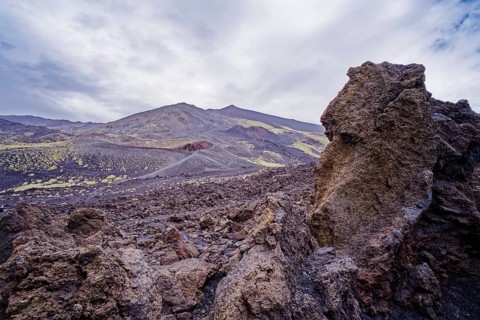 Lava rock and crater landscape around the Crateri Silvestri in the Etna National Park, Parco
