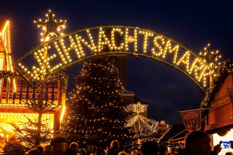 Illuminated sign Weihnachtsmarkt at the Christmas market in Husum, Schleswig-Holstein, Germany,