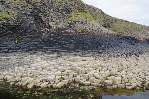 Detailed view of striking basalt formations on a coastline. Hebridean Overture, Staffa Island,