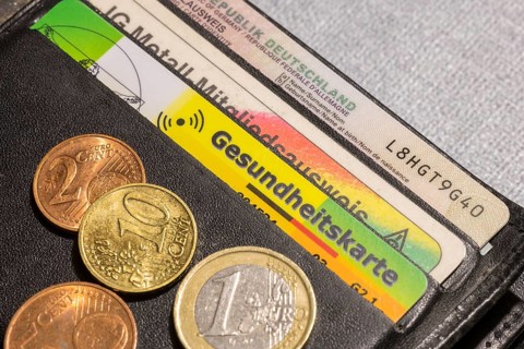 Health card, AOK insurance card, wallet, cards, money, coins, euro, cent, Germany, Europe