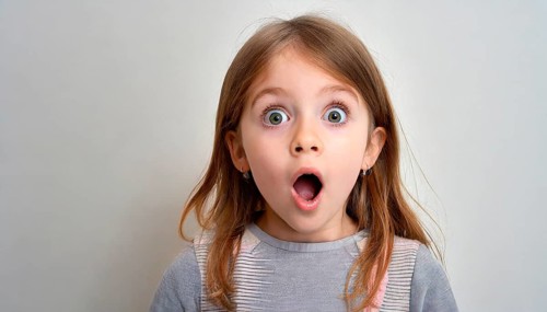 A little girl, about 9 years old, marvels with wide open eyes and mouth, AI generated