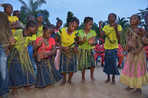 Dancing villagers at a village festival, Nkala, Bandundu Province, Democratic Republic of the Congo