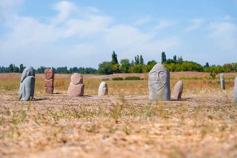 Balbals, historical gravestones in the shape of human faces, near Tokmok, Chuy, Kyrgyzstan, Asia