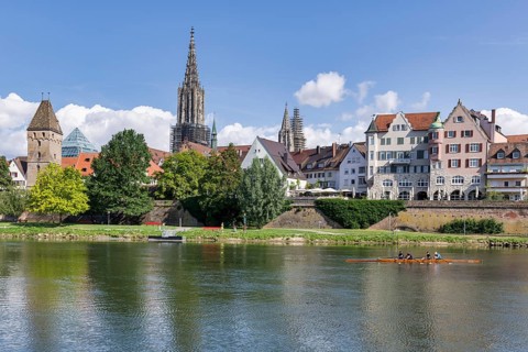 City view, Danube bank with historic old town, fishermen's quarter, cathedral, rowing boat, sports