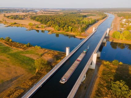 Drone shot, cargo ship on the Mittelland Canal, Magdeburg waterway junction, canal bridge,