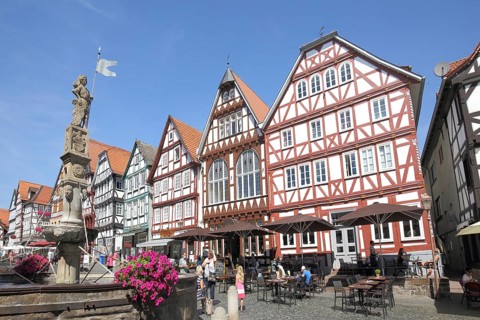 Half-timbered houses with market fountain, Rolandsbrunnen, market square, Fritzlar, Hesse, Germany,