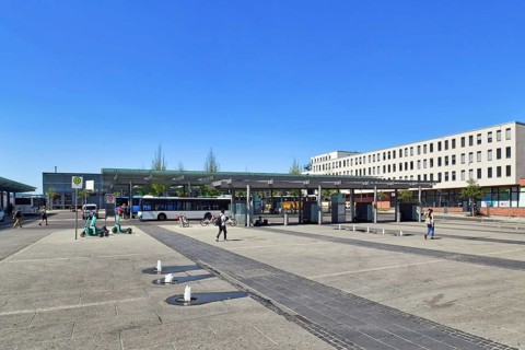 Kaiserslautern, Germany, August 2022: Central bus station at 'Guimaraes Platz' town square in front