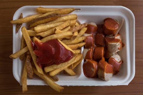 Currywurst with fries as take away, Bavaria, Germany, Europe