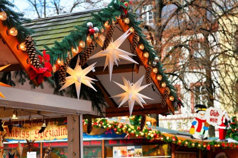 Heidelberg, Germany, November 2019: Seasonal decoration with fir branches, baubles and big paper