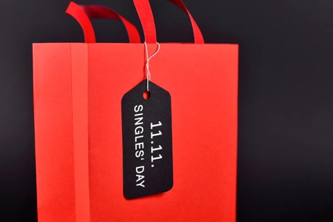 Shopping bag with tag saying '11.11. Singles' Day', a Chinese unofficial holiday and shopping