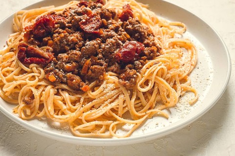 Spaghetti bolognese, with dried tomatoes, homemade, close-up