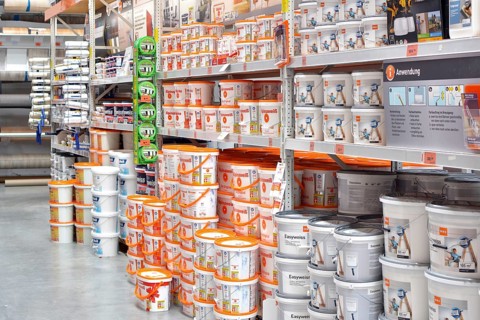 Dossenheim, Germany, April 2019: Hardware store with different kinds of wall paints in buckets for