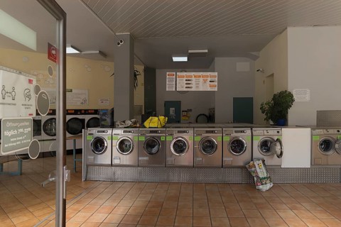 View into a launderette, Erlangen, Middle Franconia, Bavaria, Germany, Europe