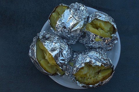 Jacket potatoes wrapped in aluminium foil, Bavaria, Germany, Europe