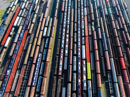 Deutsche Bahn AG marshalling yard. Many goods trains are parked on the tracks with tank wagons, car