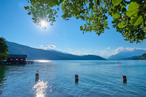 Lake, boathouse, sun, standup paddler, evening, summer, Lake Millstatt, Döbriach, Carinthia,