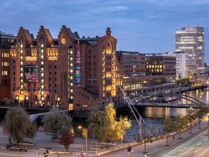 Aerial view of the International Maritime Museum Hamburg with Elbe barques surrounded by trees at